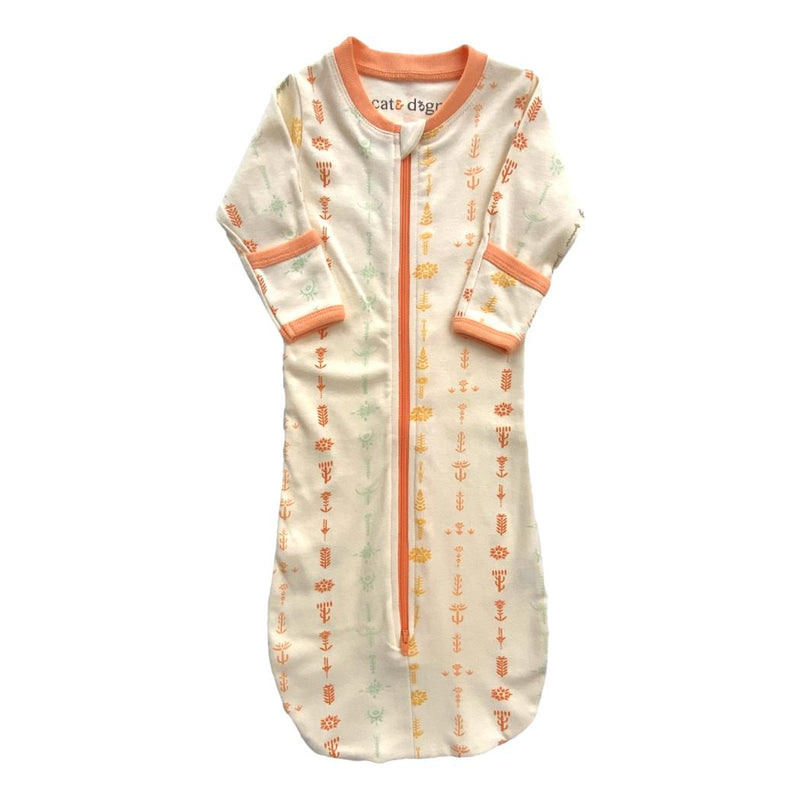 GOTS certified organic cotton sleepsack with boho floral print, long sleeves, and orange trim for safe, chemical-free baby sleep.