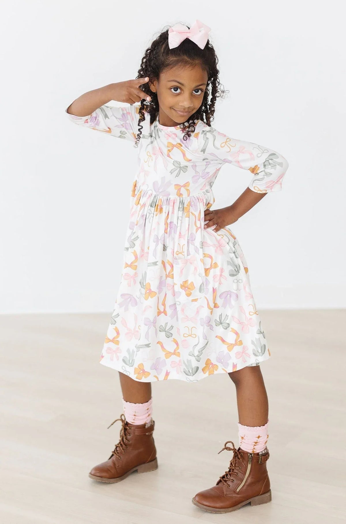 Girls white boho bows twirl dress for girls with 3/4 sleeves and colorful floral print