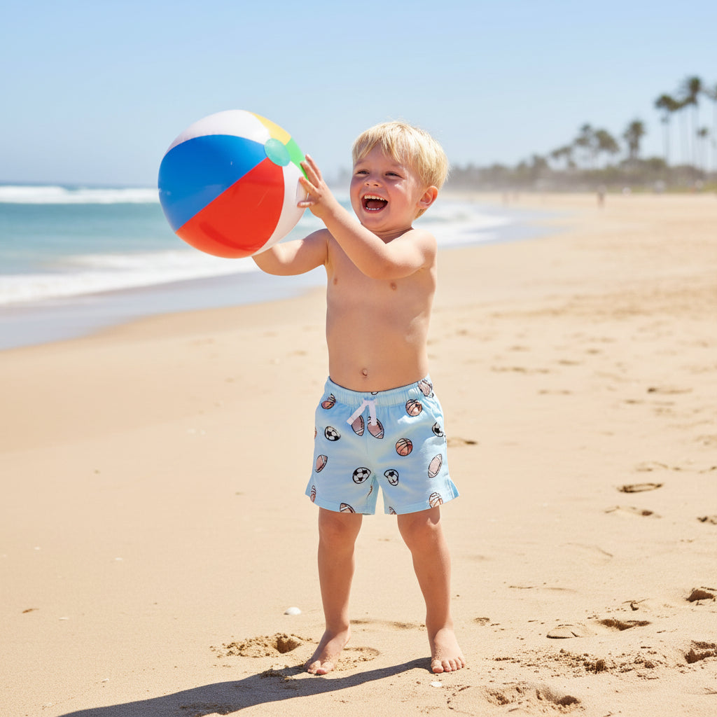 Boys Game On Play Shorts in light blue with basketball and soccer ball prints; relaxed fit, drawstring waist.