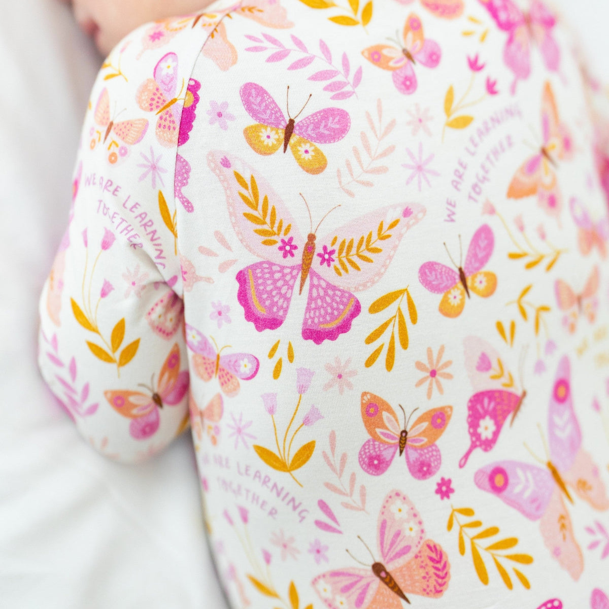 The Second-Skin Convertible Romper butterfly print fabric in Raising Mama viscose from bamboo.