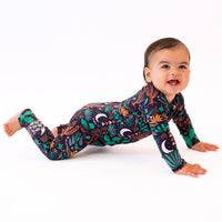 Baby in The Second-Skin Convertible Romper, Desert Cactus Midnight, bold botanical print.
