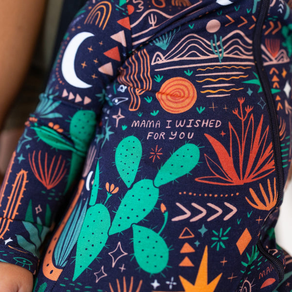 The Second-Skin Footie Desert Cactus (Midnight): navy zippered baby onesie with Mama, I Wished for You
