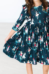 Dark teal Christmas ballet dress with ruffle 3/4 sleeves, nutcracker print, and full twirl skirt for special occasions and play.