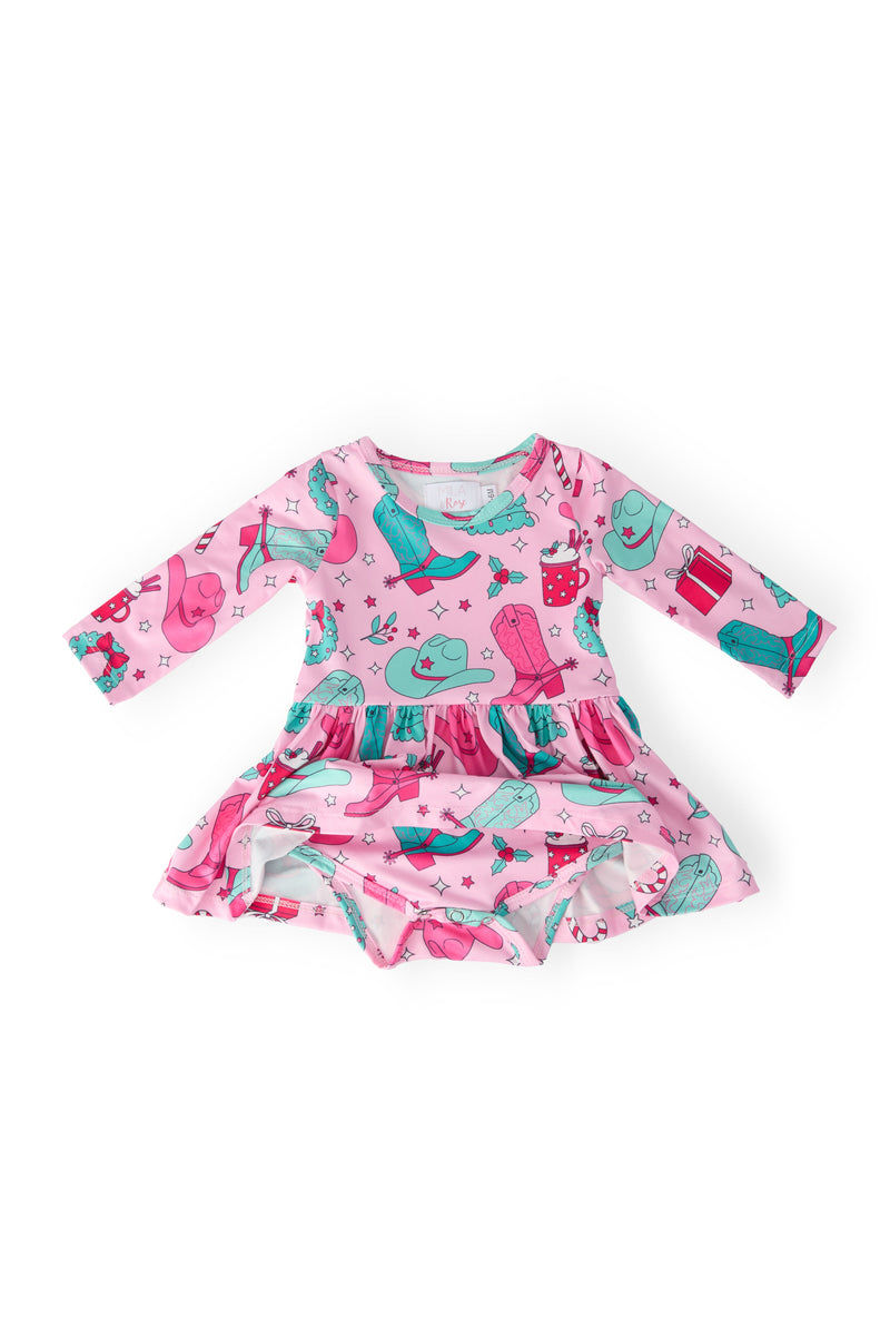 Christmas Cowgirl Long Sleeve Twirl Bodysuit displayed in pink with decorative cowgirl illustrations, ideal for twirling and festive occasions.