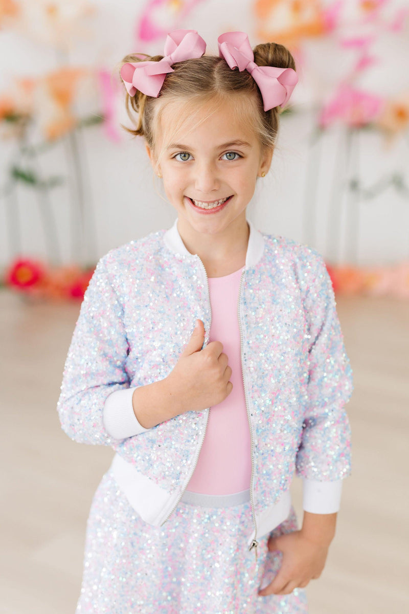 Cotton Candy Sequin Jacket for Girls - Zippered Front worn by a joyful girl, highlighting the shimmering sequins and playful style, ideal for creative expression.