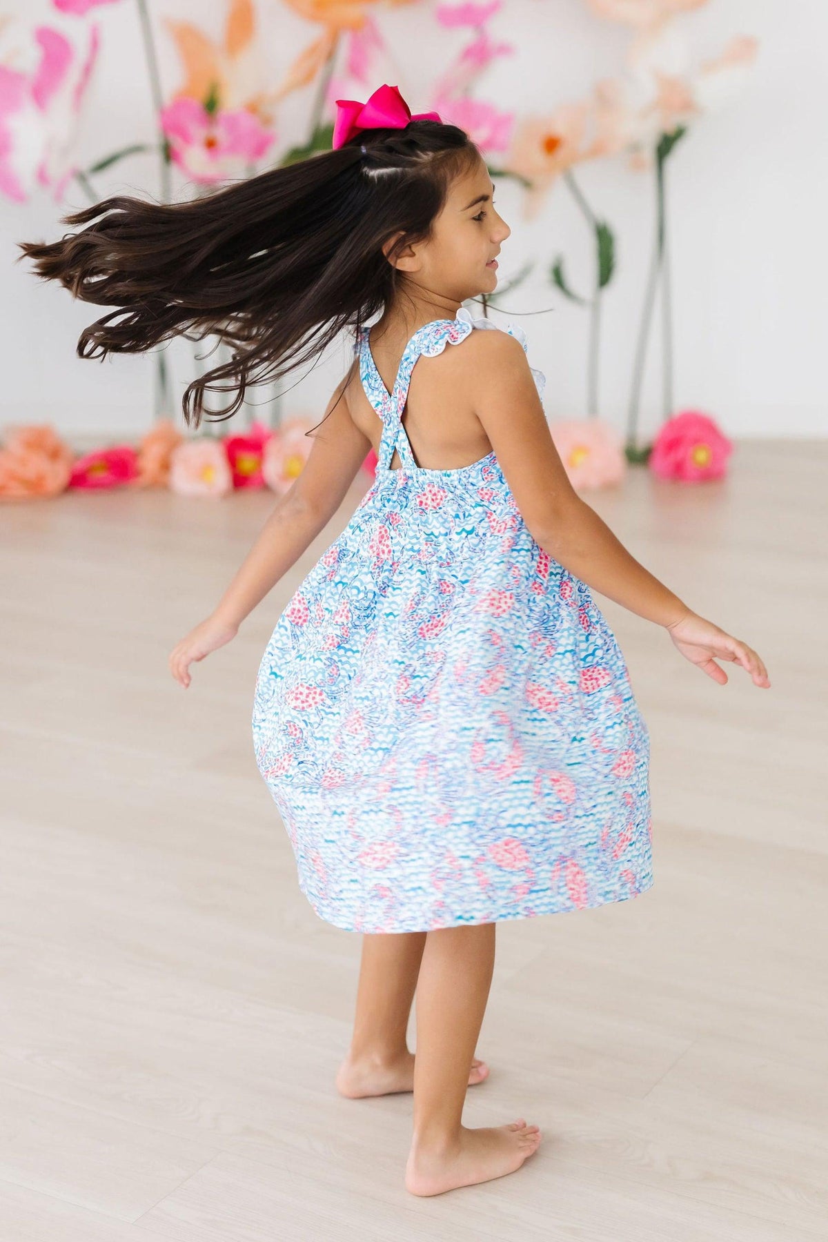 Group of kids in matching Crab Walk Ruffle Cross Back Dress, highlighting the fun coordination and summer fashion for young girls.