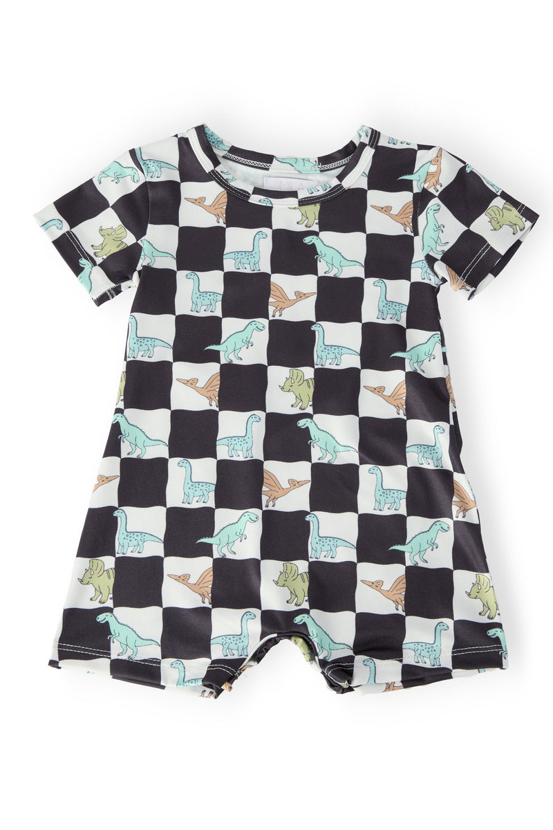 Dino Checkers short sleeve shorty one-piece romper for boys with black-and-white checkerboard and dinosaur prints.