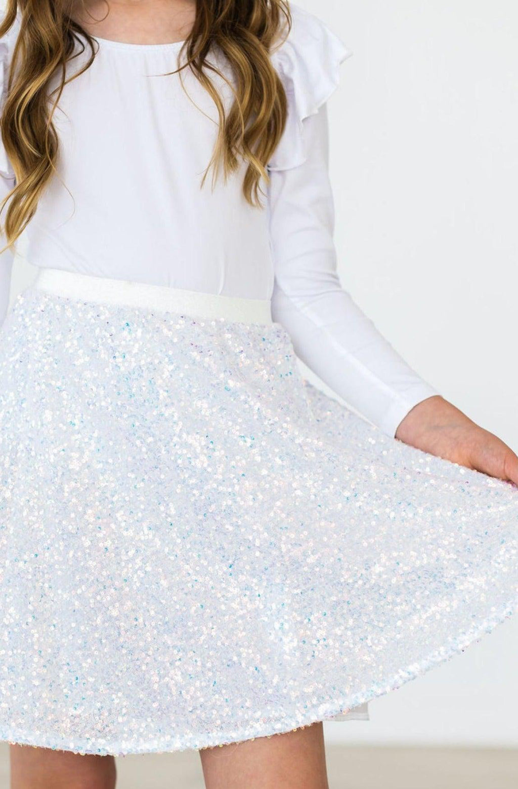 SALE Disco Sequin Twirl Skort for Girls in White, featuring sparkling sequins and a playfully twirling design, perfect for stylish young girls.