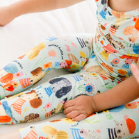 The Second-Skin 2-Piece Short Sleeve Pajama set in pastel prints, Mindful Doggos, hand-drawn motifs for tired parents.
