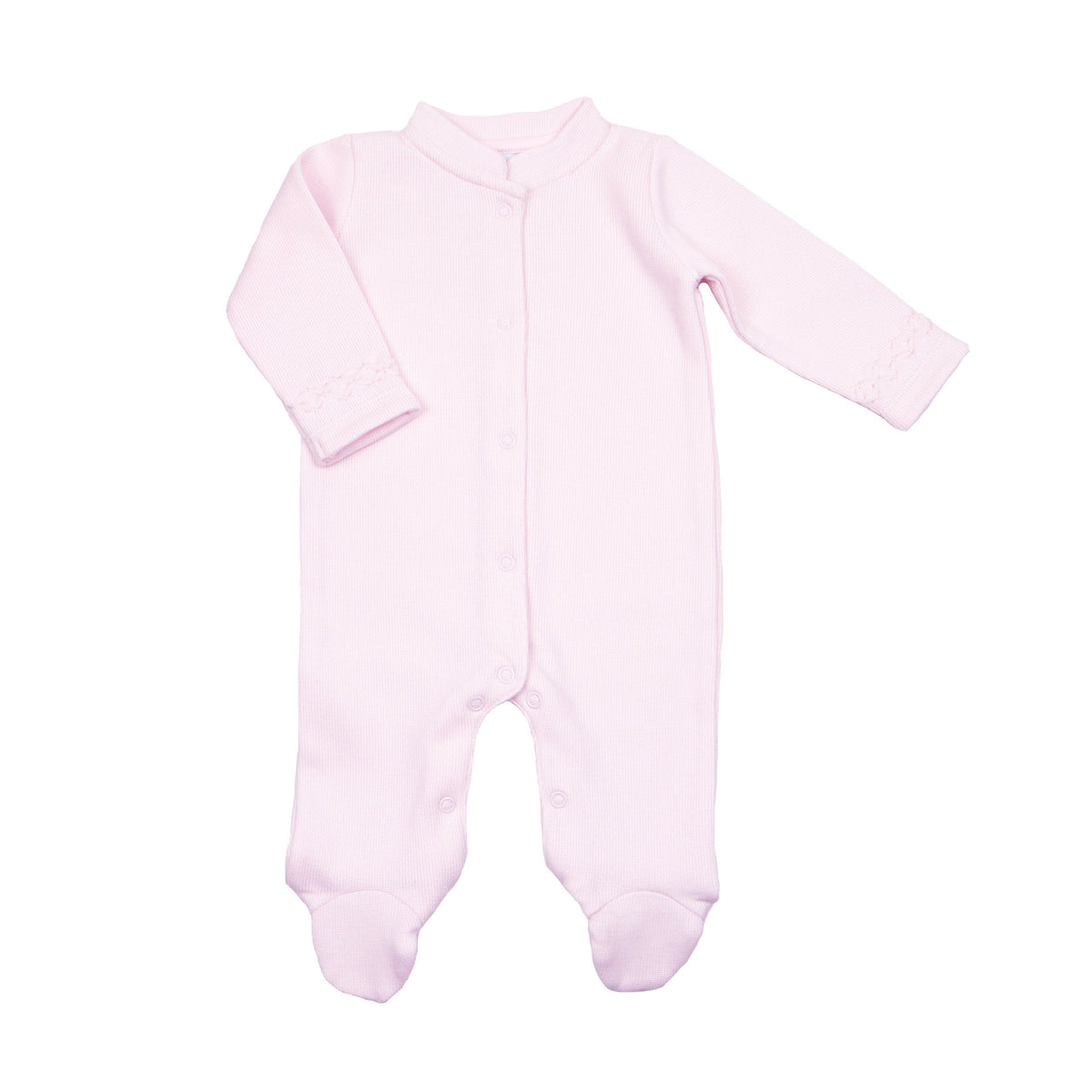 Pink hand-smocked baby footie with long sleeves and covered feet, crafted from soft cotton with delicate sleeve detailing.
