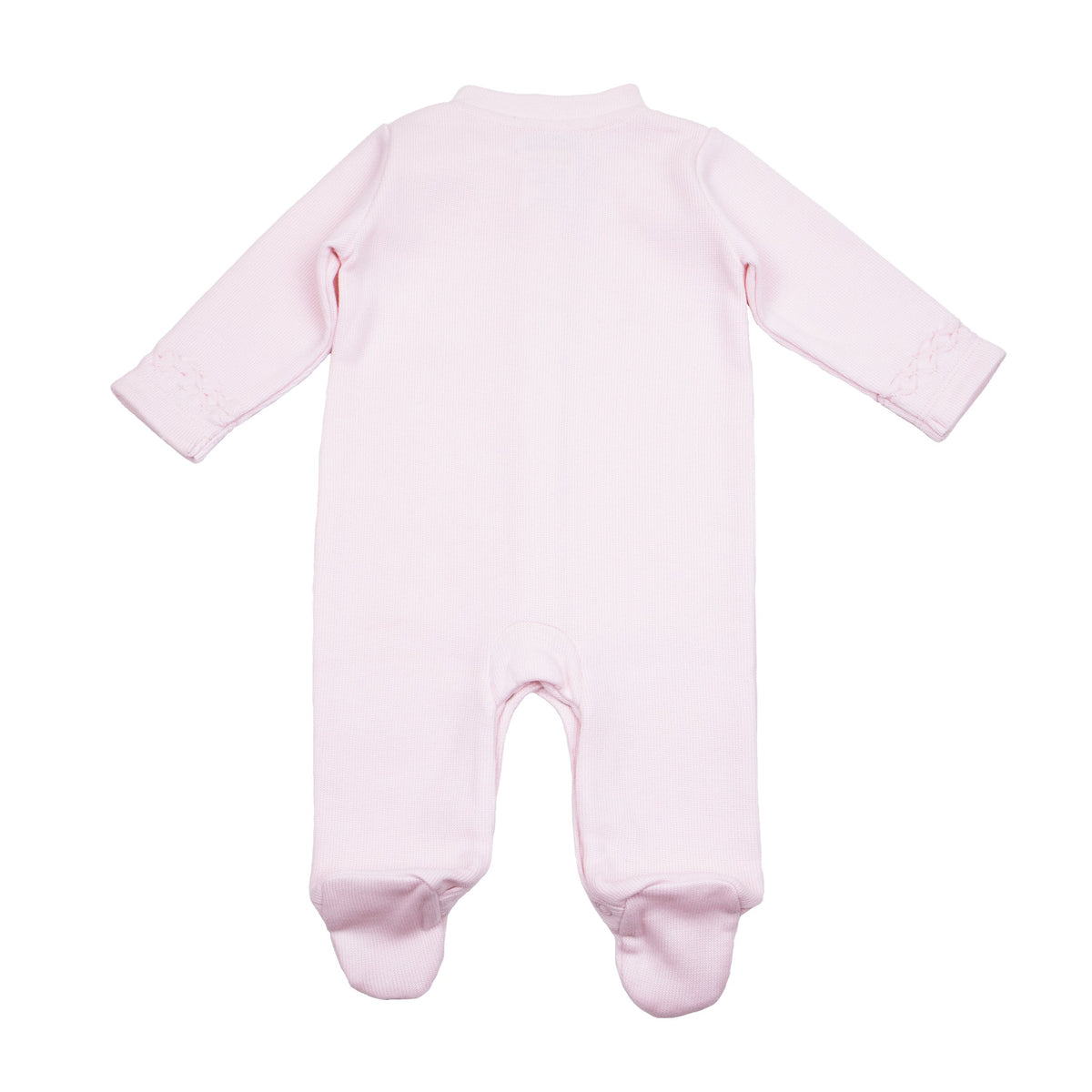 Back view of a pink hand-smocked baby footie with covered feet and delicate cuff detailing, crafted from soft Pima cotton.