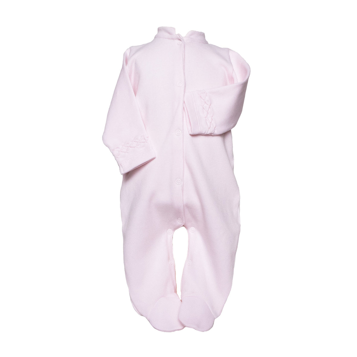 Pink baby footie with hand-smocked sleeve details, featuring long legs, enclosed feet, and front buttons for soft, elegant comfort.