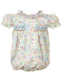 Cream floral baby bubble romper with pink blue yellow flowers and hand smocked bodice