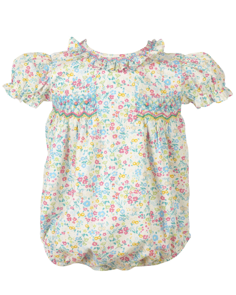 Cream floral baby bubble romper with pink blue yellow flowers and hand smocked bodice