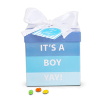 Gift box with 'It's a Boy Yay!' text and colorful candies on a white background