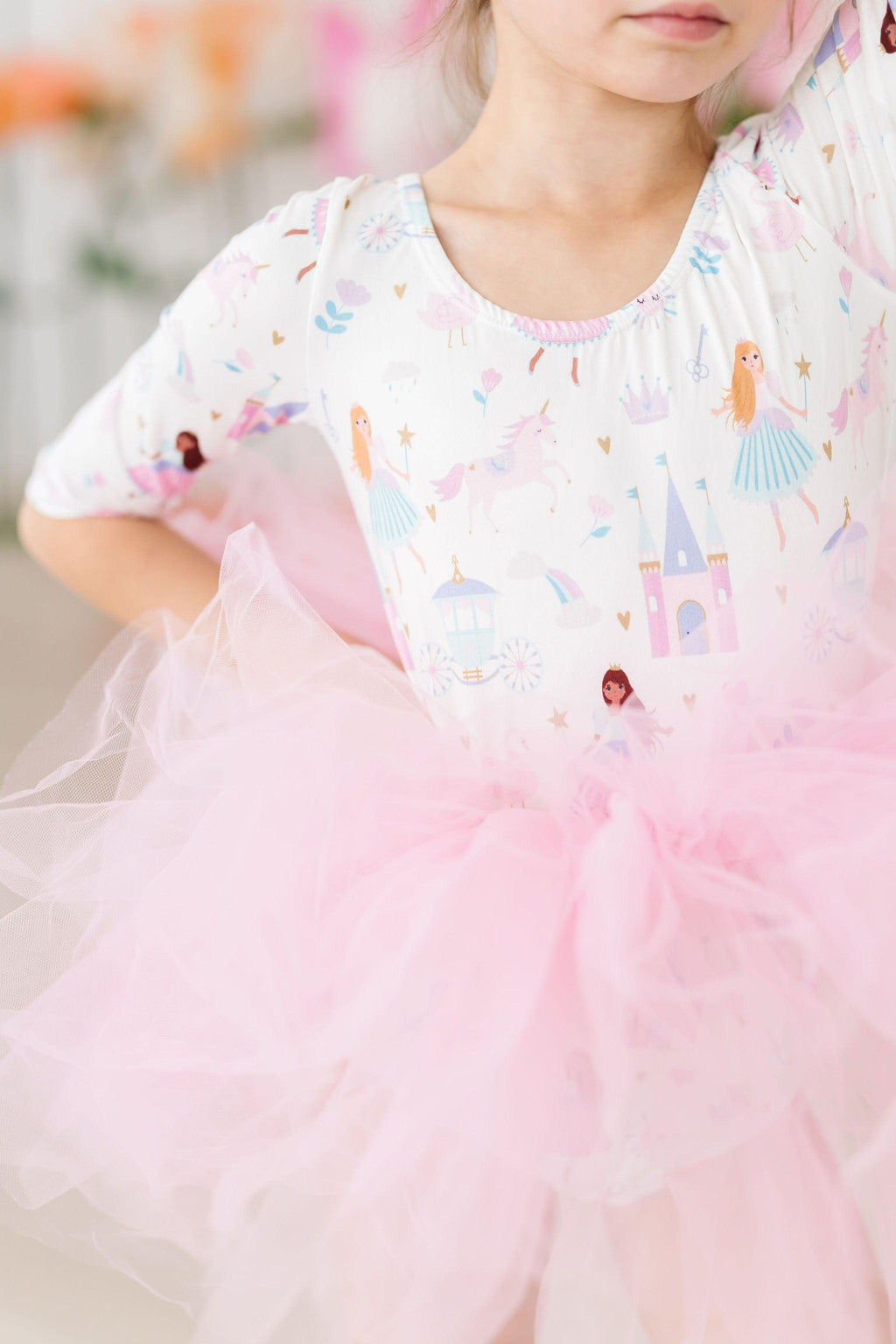 Enchanting Fairy Princess 3/4 Sleeve Tutu Leotard featuring a whimsical print of unicorns and castles, perfect for little dancers ready to twirl and leap into magical adventures.