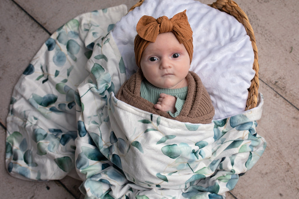Eucalyptus Embrace Minky Blanket showcasing its luxurious softness and beautiful watercolor design, perfect for adding comfort and style to any room.