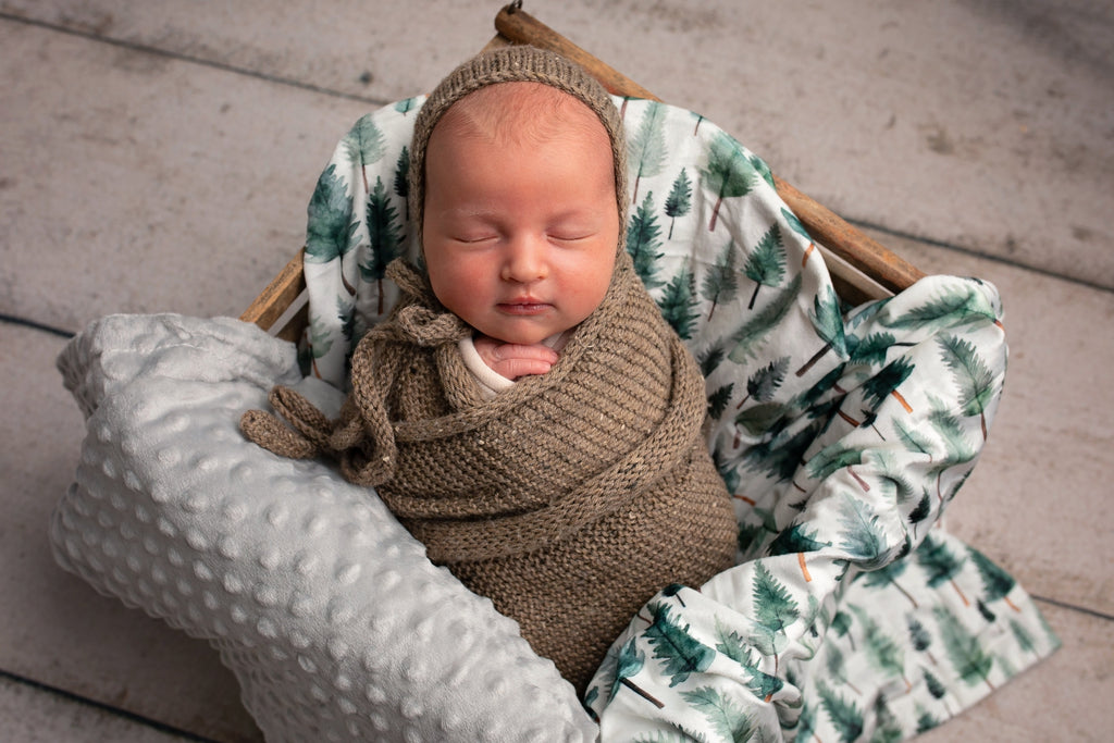 Cozy Woodland Whispers Minky Blanket showcasing its soft texture and elegant woodland design, perfect for snuggling up in style.