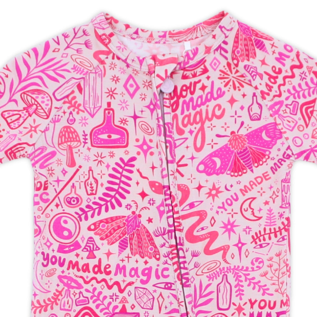 The Second-Skin Convertible Romper in Pink Mystic Mama print with zip front, buttery Raising Mama® viscose from bamboo.