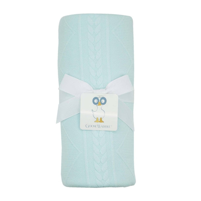 Mint Knit Blanket from Goosewaddle® wrapped with a white ribbon, showcasing its soft texture and mint color.
