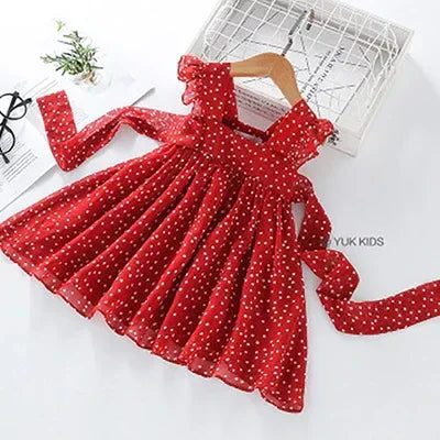 Red toddler party dress with white polka dots and puff sleeves for girls