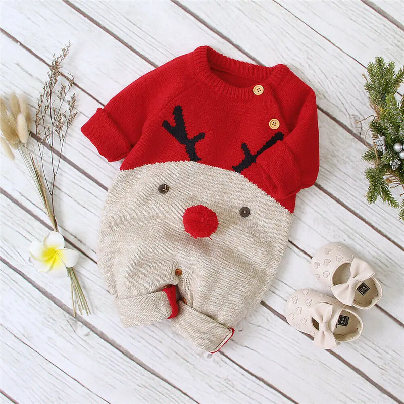 Top view of Rudy Reindeer Knit Children's Winter Romper in red and beige, showcasing its cute design.