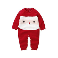 Red baby onesie with a face design on a white background