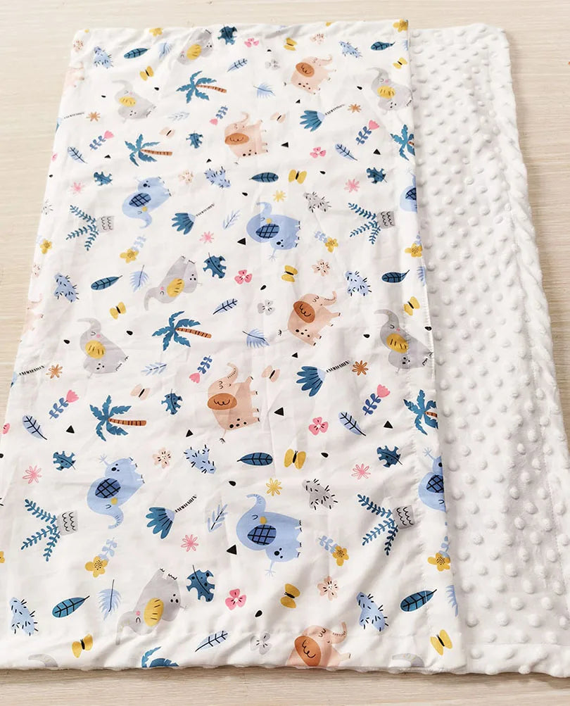 Dotted Minky blanket in colorful prints, 100 x 75 cm, lightweight polyester-cotton, white side with dotted back.