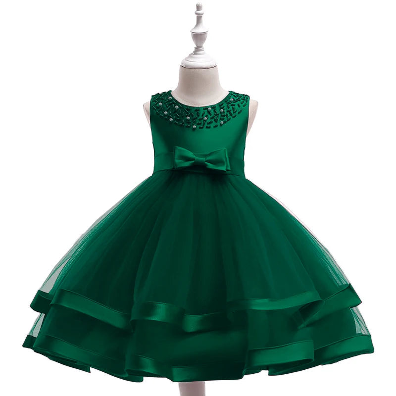 Sacha Marie Elegant Tiered Special Occasion Dress in rich green, designed with a tiered skirt, elegant beaded neckline, and a stylish bow accent.