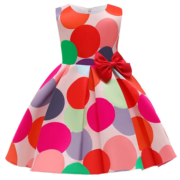 Dotty About Polka Dots dress for little girls with multicolor polka dots and a red sash bow, knee-length.
