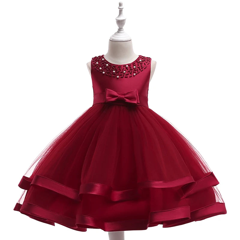 Sacha Marie Elegant Tiered Special Occasion Dress in deep burgundy, featuring a tiered design, jeweled neckline, and a decorative bow.