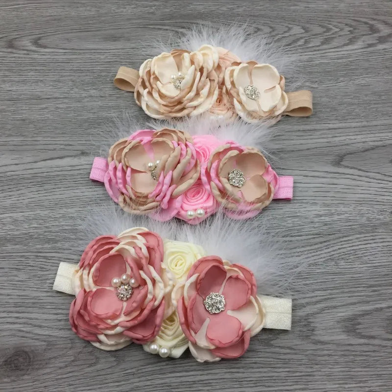 Elegant Chiffon Beaded Baby Hair Accessories featuring layered flowers in soft colors, adding a touch of charm for little girls.