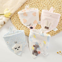Soft cotton triangle baby bibs with cute cartoon appliques, hearts, and bunnies. Absorbent feeding drool towel for boys and girls.