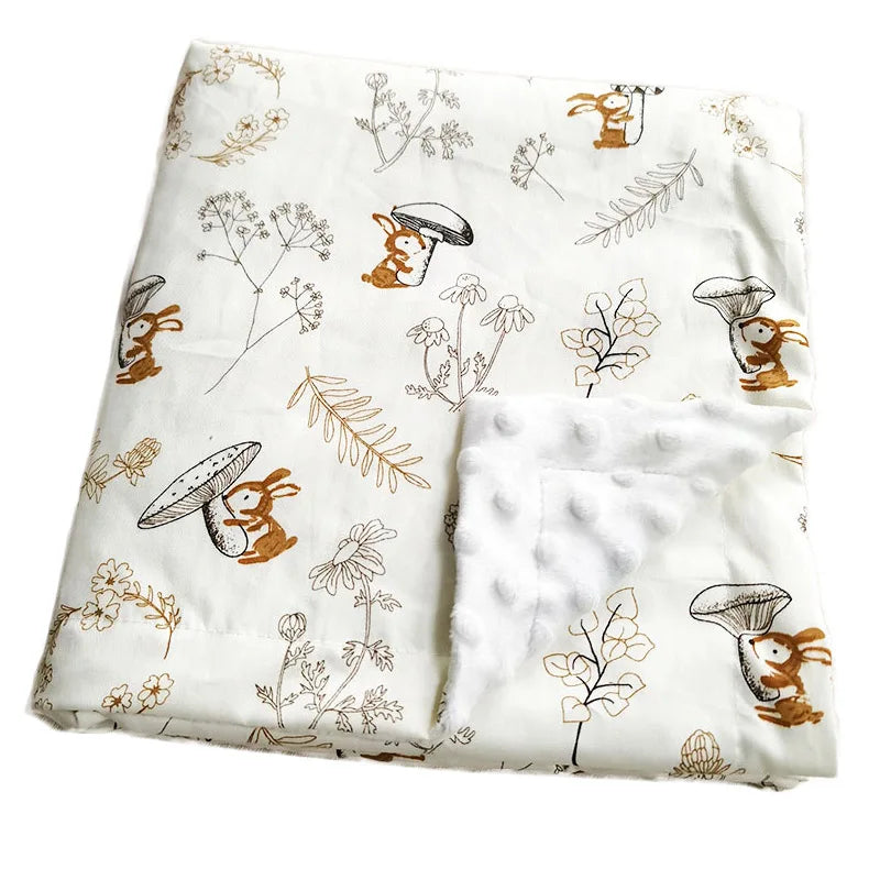 Two-sided children's Minky blanket with bunny and mushroom prints, raised dot texture, white background, 100 x 75 cm