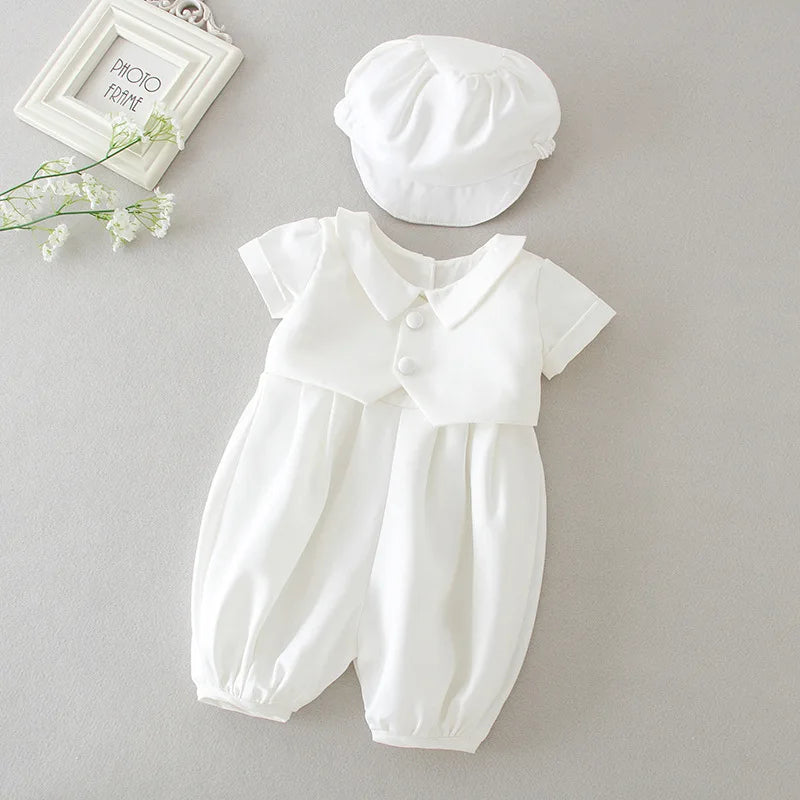 White short-sleeve romper set for baby boys featuring a turn-down collar, button front, and matching cap for special occasions.