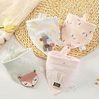 Soft cotton triangle baby bibs with cute cartoon animal appliqués. Breathable feeding aprons for boys and girls to keep clothes dry.
