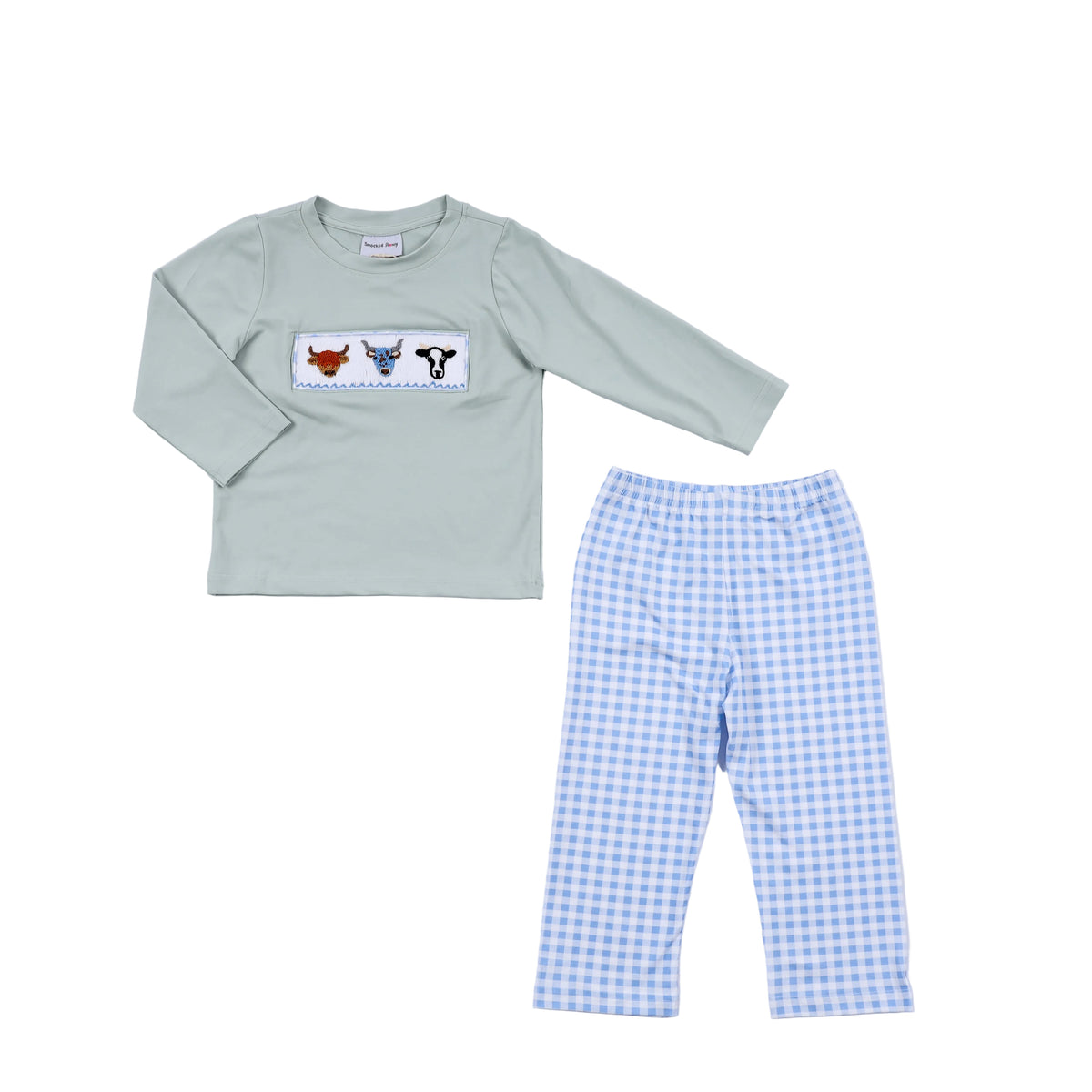Children's pajama set with long-sleeve shirt and checkered pants on a light gray background