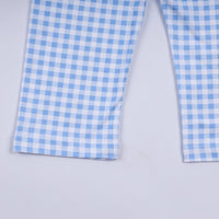Blue and white checkered fabric on a light gray background