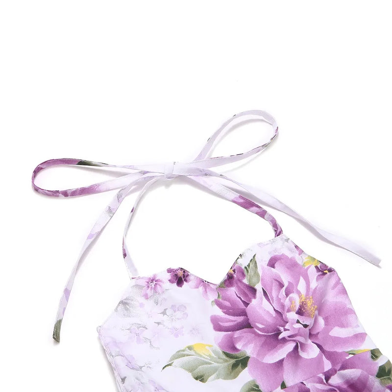 Close-up of the halter neck tie detail on the 'Oh Suzannah' Floral Party Dress for girls.
