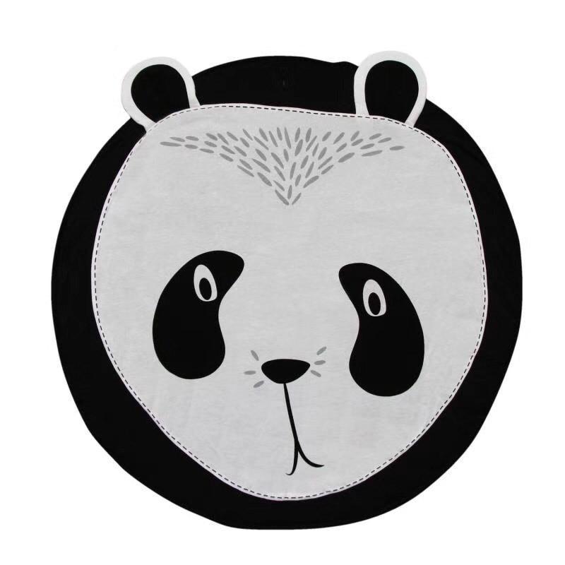 Round cushion with a panda face design on a white background
