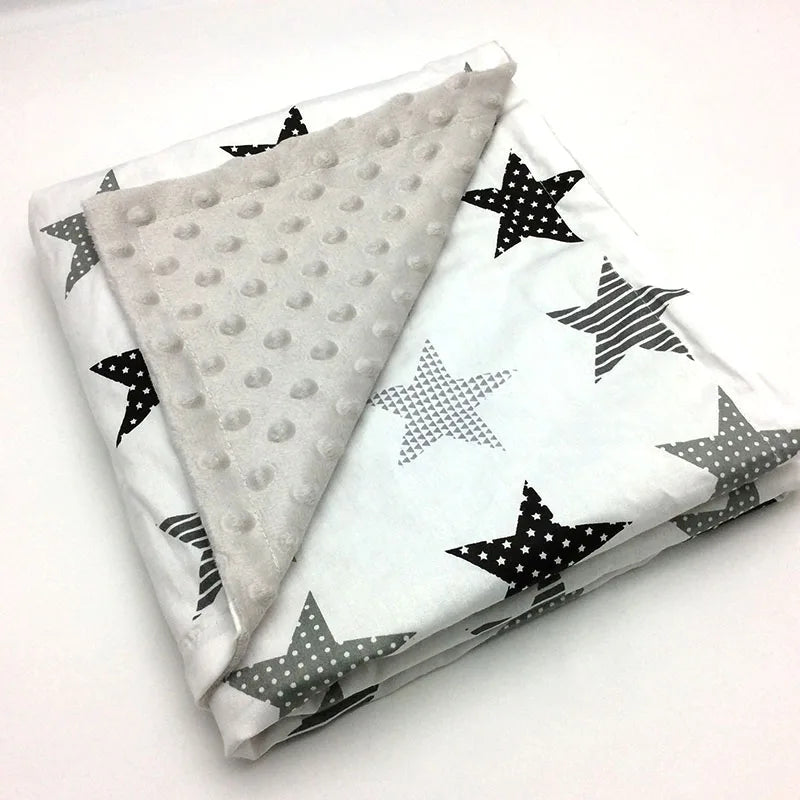 Star-patterned Dotted Minky Blanket with dotted grey underside, 100x75cm, lightweight for babies and young children.