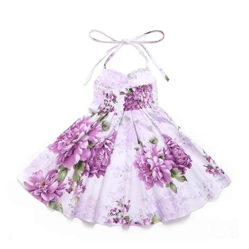 Back view of the 'Oh Suzannah' Floral Party Dress showcasing the gathered design and floral pattern.