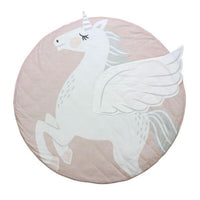 Round pink rug with a white unicorn design on a white background