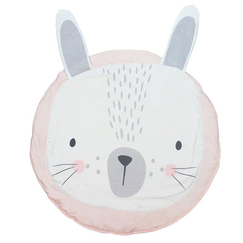 Round cushion with a rabbit face design on a white background