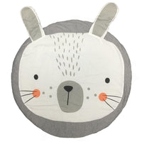 Round cushion with a bear face design on a white background