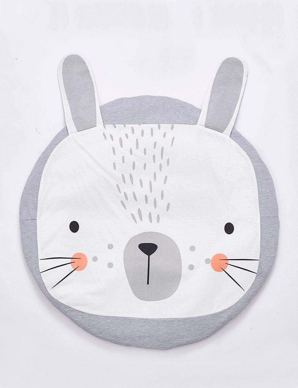 Round cushion with a rabbit design on a white background