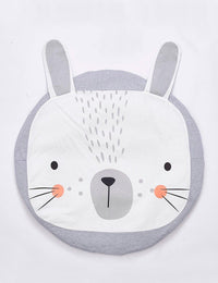 Round cushion with a rabbit design on a white background
