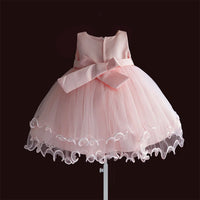 Pink dress for newborns to 3 months with a large satin bow, knee-length tulle gown for birthdays and weddings; back zip.