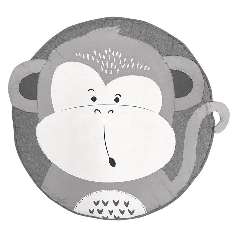 Round mat with a monkey face design on a white background