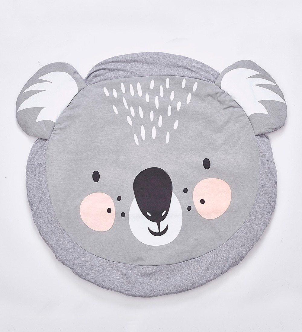 Gray koala-shaped cushion on a white background